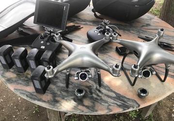 На новых снимках дрона DJI Phantom 5 хорошо виден контроллер и камера со сменным объективом