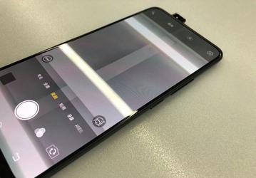 Опубликована фотография нового безрамочного смартфона Vivo