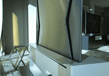 LG показала уникальный телевизор LG OLED TV R, который скручивается внутрь подставки