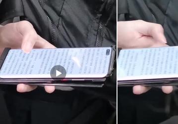 Работающий Huawei Mate 40 Pro в руках пользователя. Фото из китайского метро