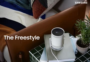 Представлен уникальный портативный проектор The Freestyle. Samsung встроила в него умную колонку и светильник