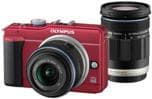 Камера Olympus E-PL1S с объективом 14-42 мм весит 454 грамма