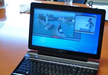 Toshiba показала ноутбук 3D Qosmio, трехмерное изображение на экране которого видно невооруженным глазом