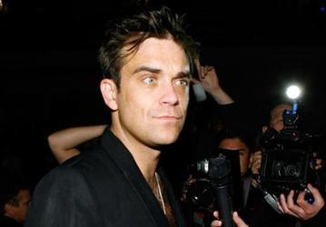  Robbie Williams планирует заключить сольный контракт