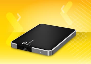 Внешний накопитель WD My Passport Air объемом 1 ТБ оформлен в стиле компьютеров Apple Mac
