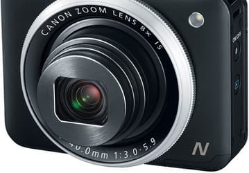 Для спуска затвора в камере Canon PowerShot N2 используется кольцо вокруг объектива