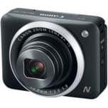 Для спуска затвора в камере Canon PowerShot N2 используется кольцо вокруг объектива