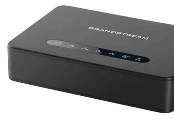 Адаптер Grandstream HT814 позволяет подключить к сети VoIP до четырех аналоговых телефонных или факсимильных аппаратов.
