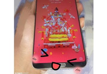 Снимок безрамочного смартфона Meizu демонстрирует наличие кнопки mBack, несмотря на дисплей 18:9
