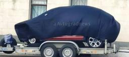 Новую модель Lada, накрытую пологом, сфотографировали на заводе. Возможно это кроссовер на базе Lada Vesta