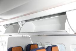 Российские самолеты SJ-100 и МС-21 получили отечественные багажные полки, способные выдержать массу легкового автомобиля
