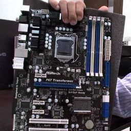 На плате ASRock чипсет Intel P67 объединен с разъемом LGA 1156