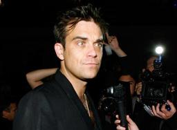 Robbie Williams планирует заключить сольный контракт