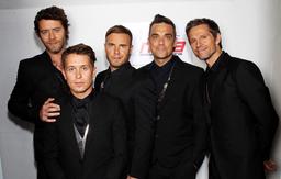 Robbie Williams остается с Take That